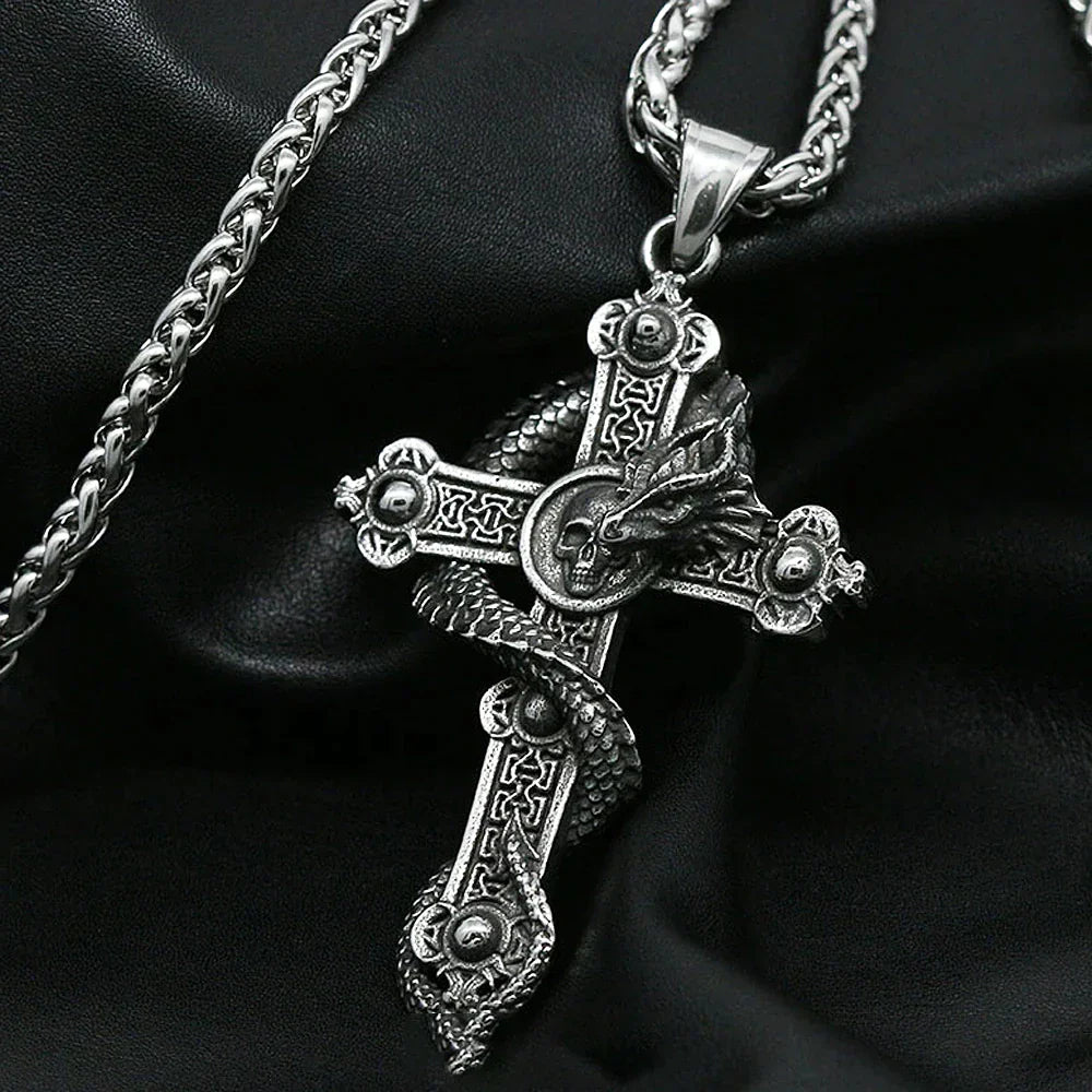 Skull and dragon cross pendant