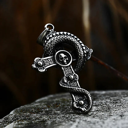 Skull and dragon cross pendant