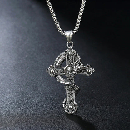 Skull and dragon cross pendant