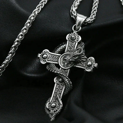 Skull and dragon cross pendant